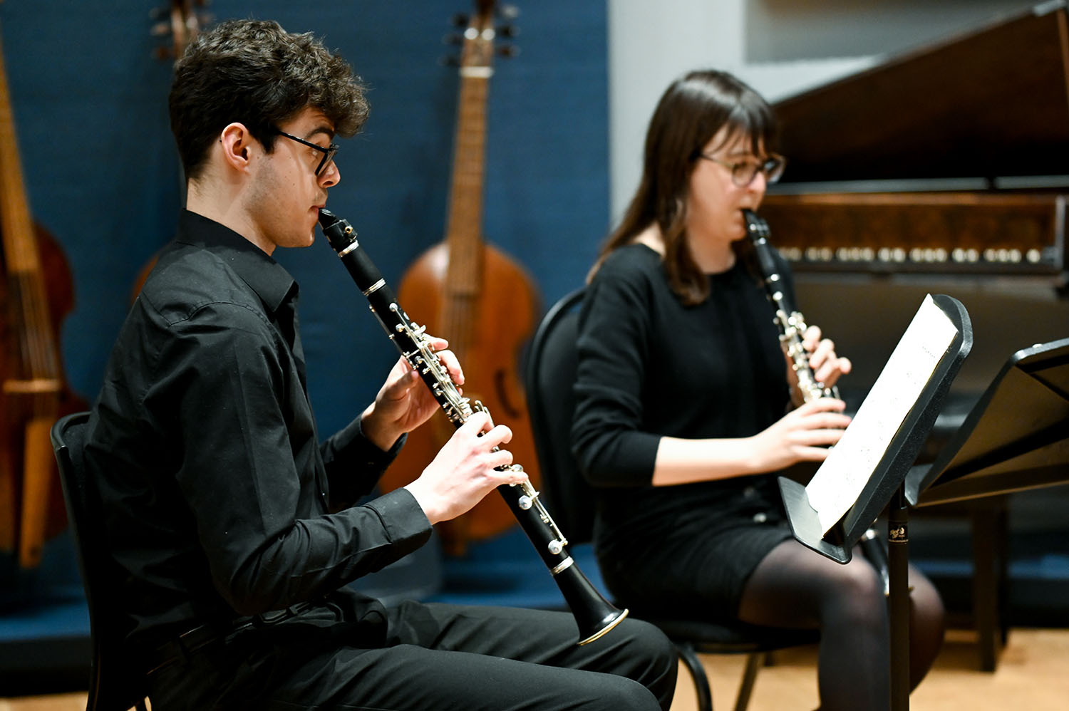 Two clarinet players performing in the RCM Museum