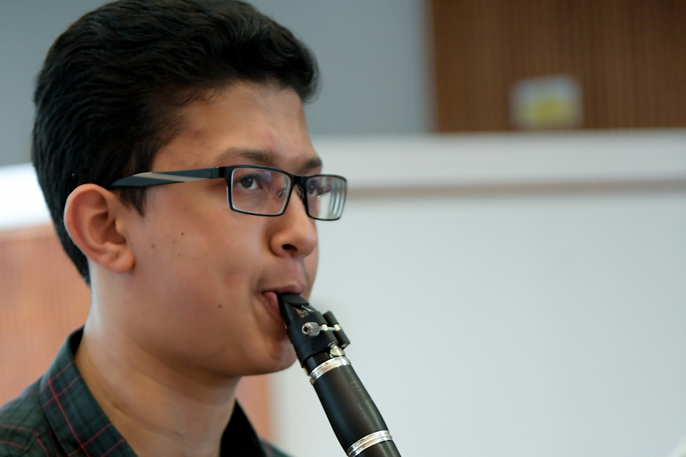 A young musician from the RCM Junior Department plays the clarinet
