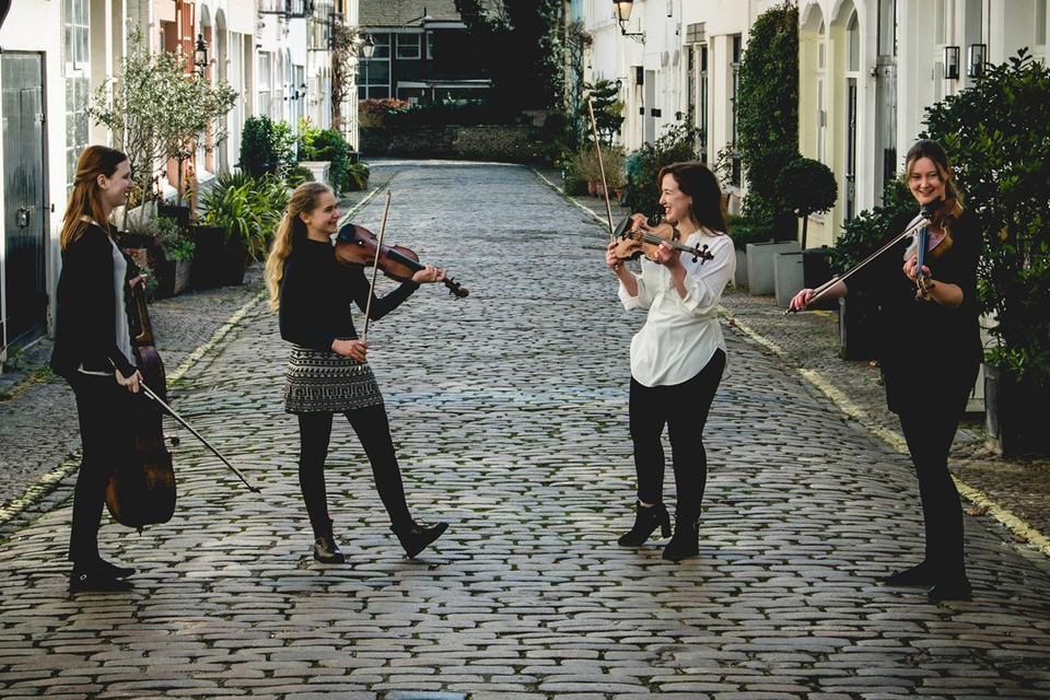 The Alkyona String Quartet, shown performing in a London street