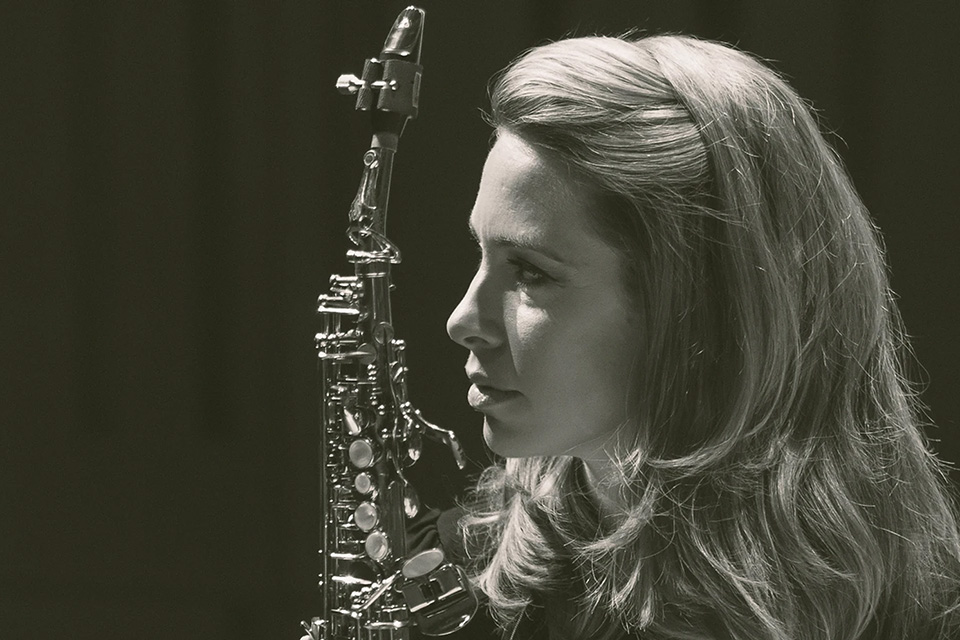A black and white headshot of saxophonist and RCM alumna Amy Dickson