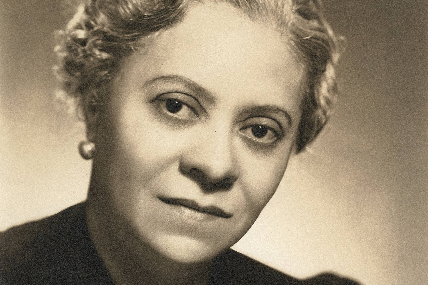 A sepia headshot of composer Florence Price