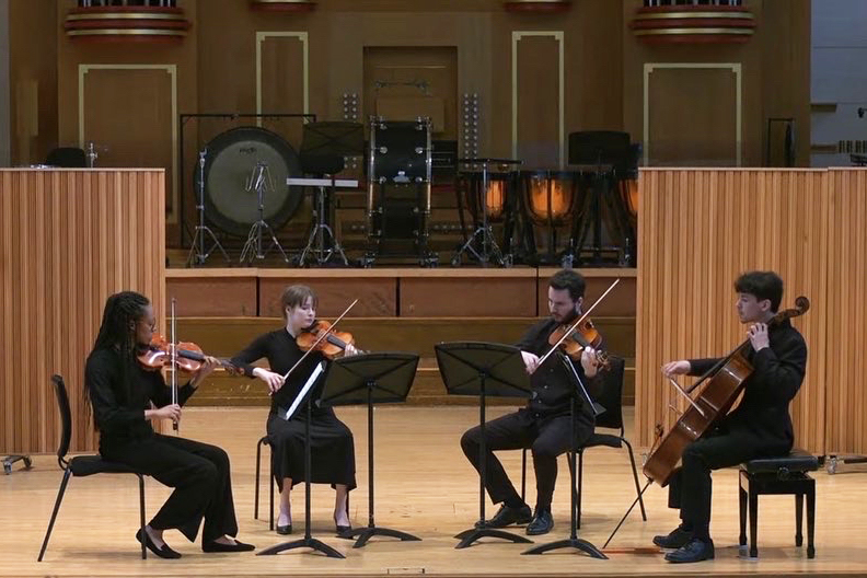 Fortuna Quartet performing on stage