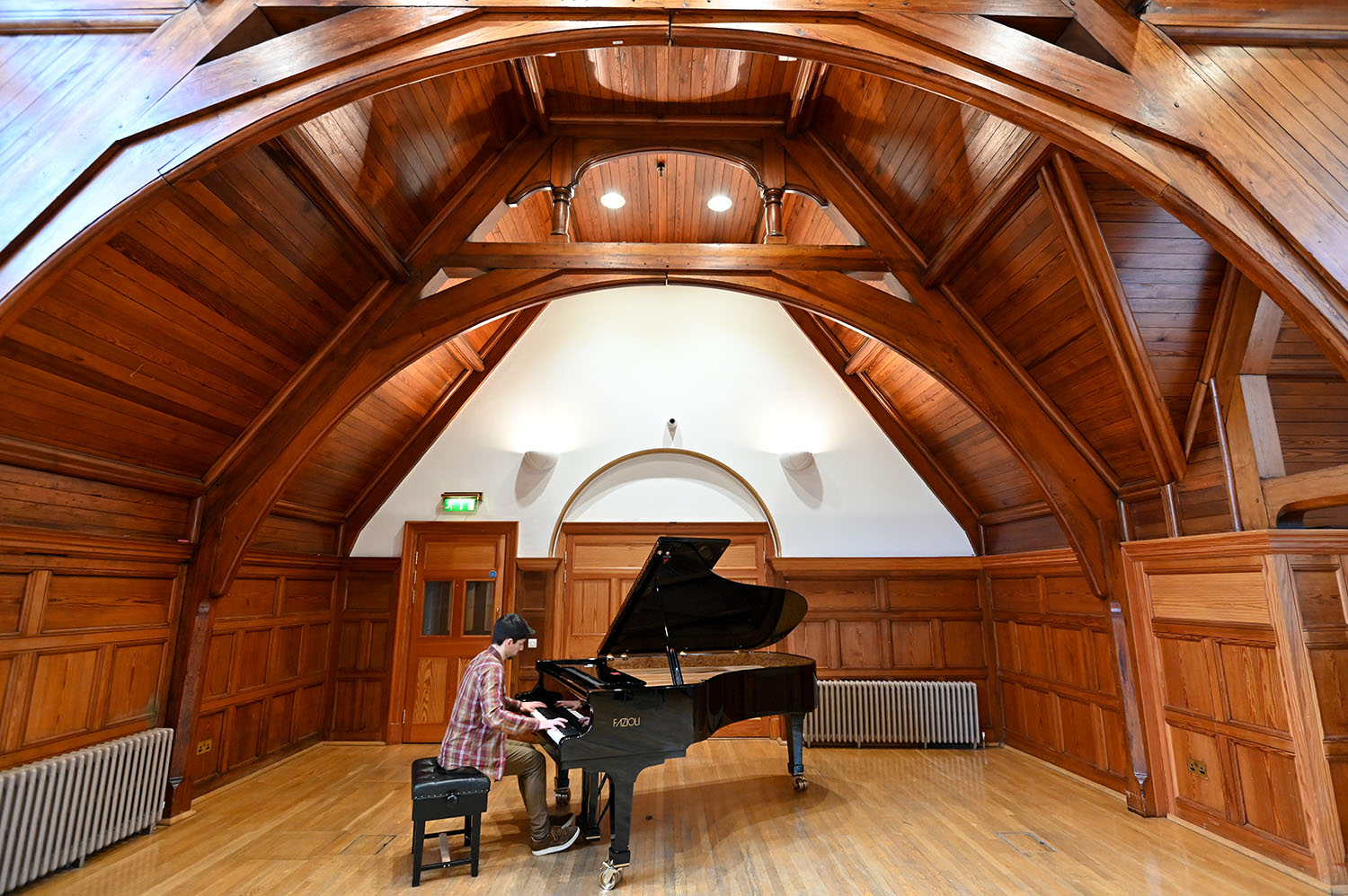 A pianist performing in the Inner Parry Room