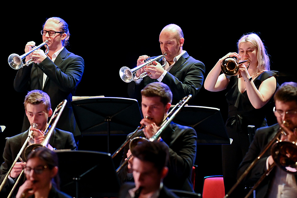 Trumpets and trombone players of the RCM Jazz Orchestra in concert