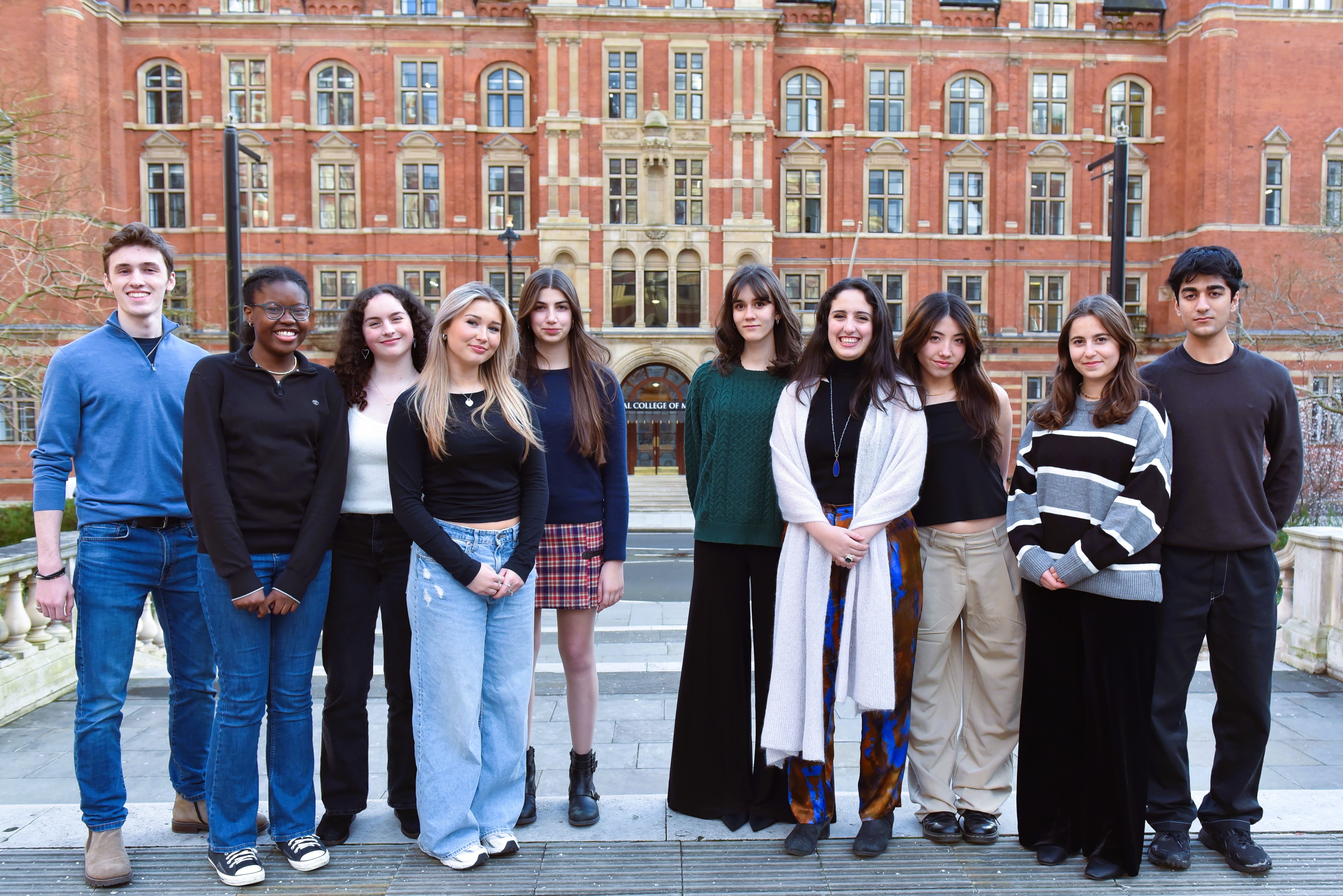 Ten RCM Junior Department students standing outside the College