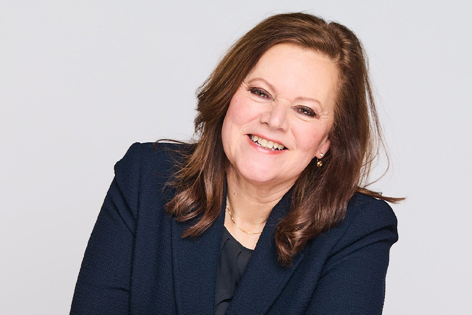 Kathryn Stott wears a navy blazer and smiles
