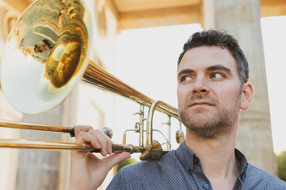 Martin Schippers, pictured holding his trombone over his shoulder