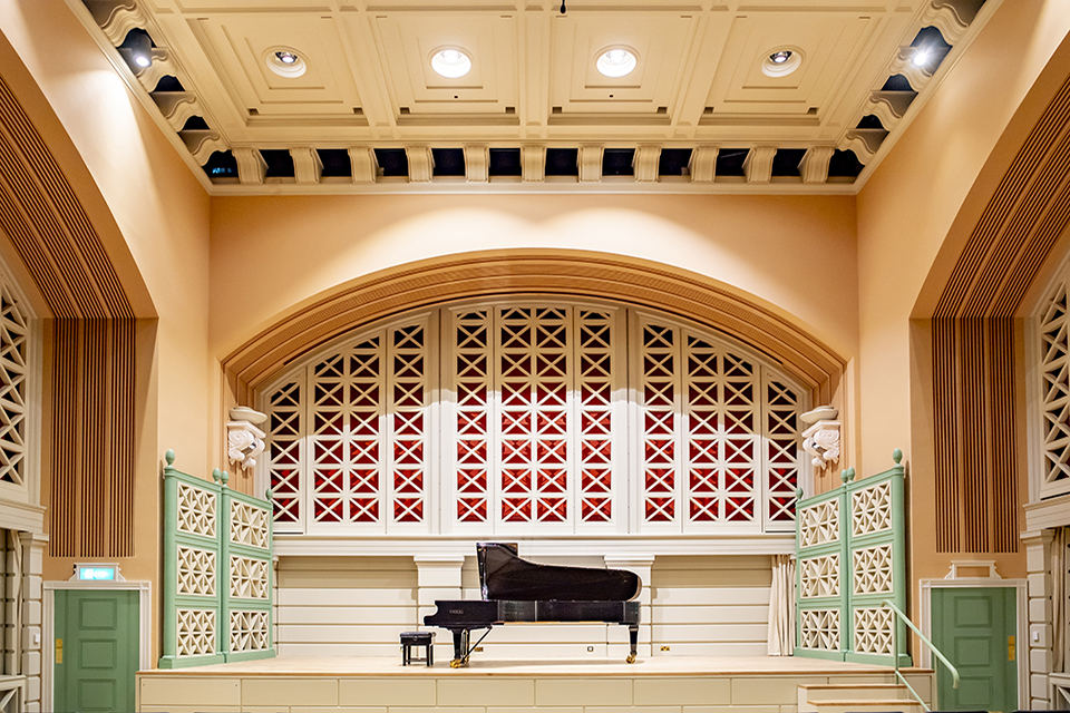 The RCM Performance Hall stage, with a grand piano in the centre