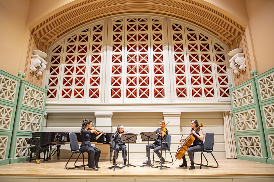 A string quartet on stage in the Performance Hall