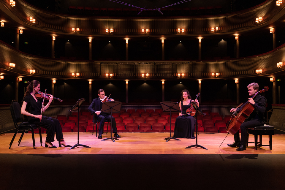 String quartet in the centre of a stage